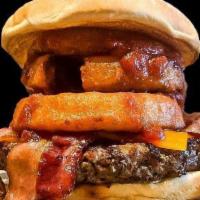 Western Burger · 100% Fresh PNW ground Beef patty with Bacon, Cheddar, Onion Rings and house made BBQ Sauce; ...