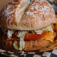 Crispy Chicken Sandwich · Crispy Chicken breast stacked with Lettuce, Tomato, Pickles, Onions, and Special Sauce (cont...