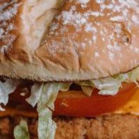 Crispy Chicken Sandwich Combo · Crispy Chicken breast stacked with Lettuce, Tomato, Pickles, Onions, and Special Sauce (cont...