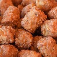Tater Tots · Enjoy grated potatoes formed into small cylinders and deep-fried to a golden brown perfectio...