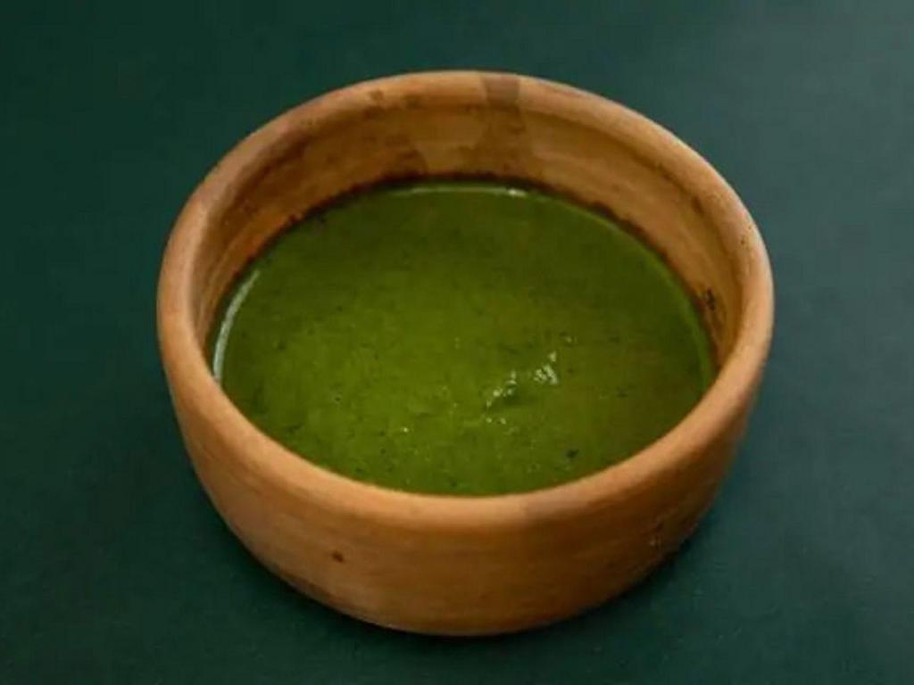 Cilantro Chutney · A cooling housemade blend of cilantro, garlic, and cumin seed.