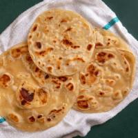 Roti · Homestyle Indian flatbread made with whole wheat flour (2 pieces)