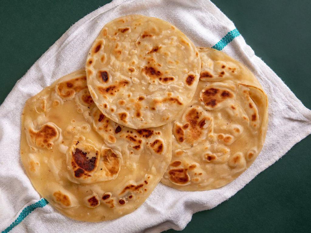 Roti · Homestyle Indian flatbread made with whole wheat flour (2 pieces)