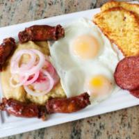 Cuatro Golpes · The 4 hits. Mashed greens plantain with 2 eggs, 2 cheese, 2 salami and 2 sausage.