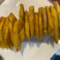 Tostones  · Green fried plantains 
