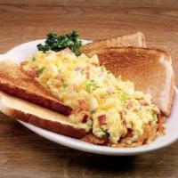 T.J. Scramble · Crispy hash browns topped with a mixture of scrambled eggs, tomatoes,green peppers, onions,h...