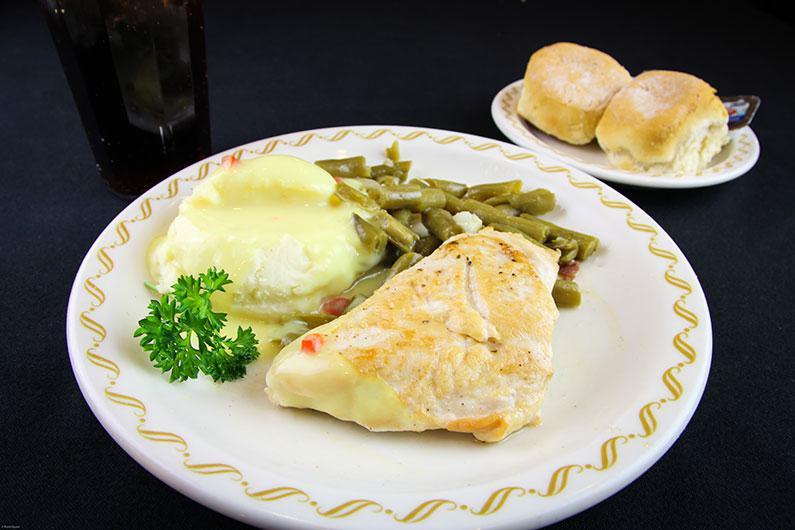 Grilled Chicken Breast · Skinless breast, lightly seasoned, choice of 2 sides, biscuits, or a roll.