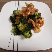 96. Chicken with Broccoli · Served with white rice.