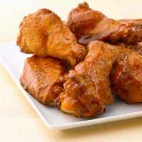 Buffalo Wings · Spicy. Served with choice of dipping sauce.