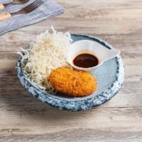 Crab Croquette Dish · Rolled in breadcrumbs and fried. 