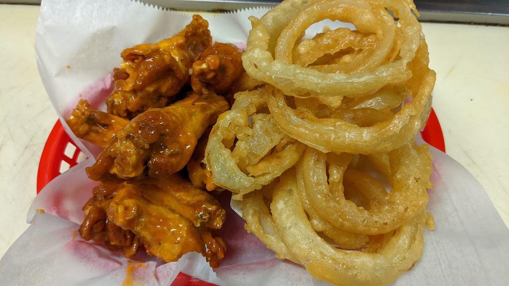 8 Wings · 8 jumbo wings, fried to perfection and tossed in your favorite sauce, a regular side, and 1 dipping sauce.