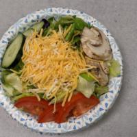 Side Salad · Iceberg/Romaine blend, fresh mushrooms, tomato, cucumber, & cheddar jack cheese.