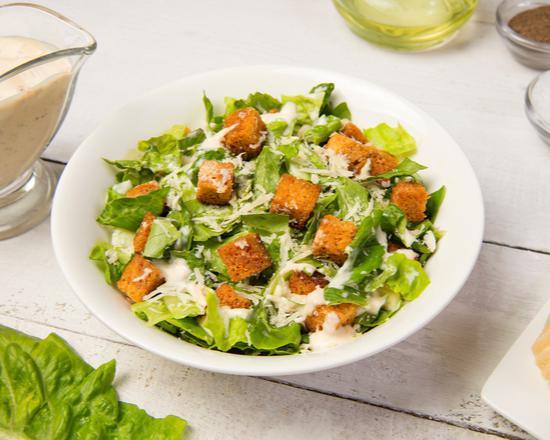 Caesar Salad · Fresh salad made with romaine lettuce, sliced Romano cheese and homemade garlic roasted croutons.
