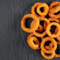 Onion Rings · Onions battered in flour and deep-fried.