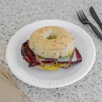 Ellis Island Hot Pastrami Sandwich Lunch · Rye bagel with Swiss cheese, grilled onion and spicy mustard.