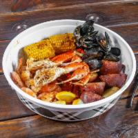Seafood Boil NC Special · 1/2 lb. mussels, 1/2 lb. snow crabs legs, 1/2 lb. shrimp, sausage, corn and red potatoes.