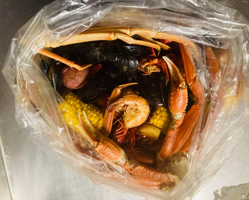 CC Special · 1 lb. snow crab legs, 1 lb. shrimp (headless), 1 lb. crawfish,1 lb. mussels, sausage, corn, red potatoes.