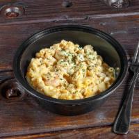 Seafood Mac N Cheese · Lump crab meat and shrimp with 4 cheeses and Cajun spices.