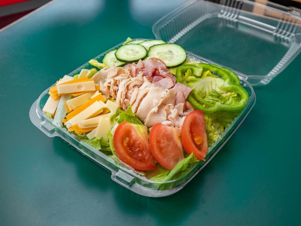 Chef Salad · Turkey, ham, cheddar & Swiss cheese, tomato, cucumbers, bell peppers & onions on romaine lettuce.