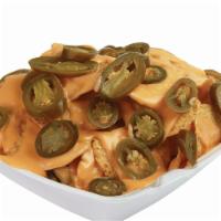 38. Nachos · Served with nacho cheese sauce and jalapeno.