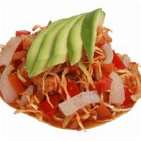 42. Tostada del Moco ( Very Spicy) · Cueritos, cabbage, tomato, avocado, and key lime juice mixed with our very spicy Clement's s...