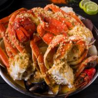Dungeness Crab · Comes with potato and corn.