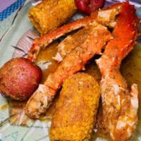 1 lb King Crab Legs · Comes with potato and corn.