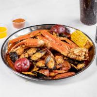 Combo A · 1/2 Craw fish, 1/2 lb Shrimp( head off),1/2 lb Black mussel, Served in a bag with your choic...