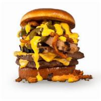 El Fuego Burger · A double burger served on a toasted brioche bun, topped with smoked brisket, spicy jalapeno ...