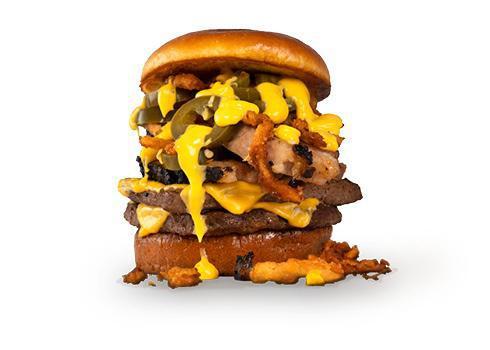 El Fuego Burger · A double burger served on a toasted brioche bun, topped with smoked brisket, spicy jalapeno cheese sauce, pickled jalapenos, and crispy onion tanglers.  