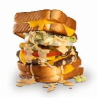 Double Royale Grilled Cheese · A double cheeseburger served between two grilled cheese sandwiches, topped with shredded let...