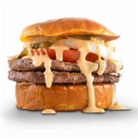 Double · Two ¼ pound beef burgers on a buttery toasted brioche bun
