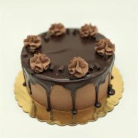 The Breakup Cake · Chocolate cake, chocolate mousse filling, chocolate buttercream, chocolate ganache.