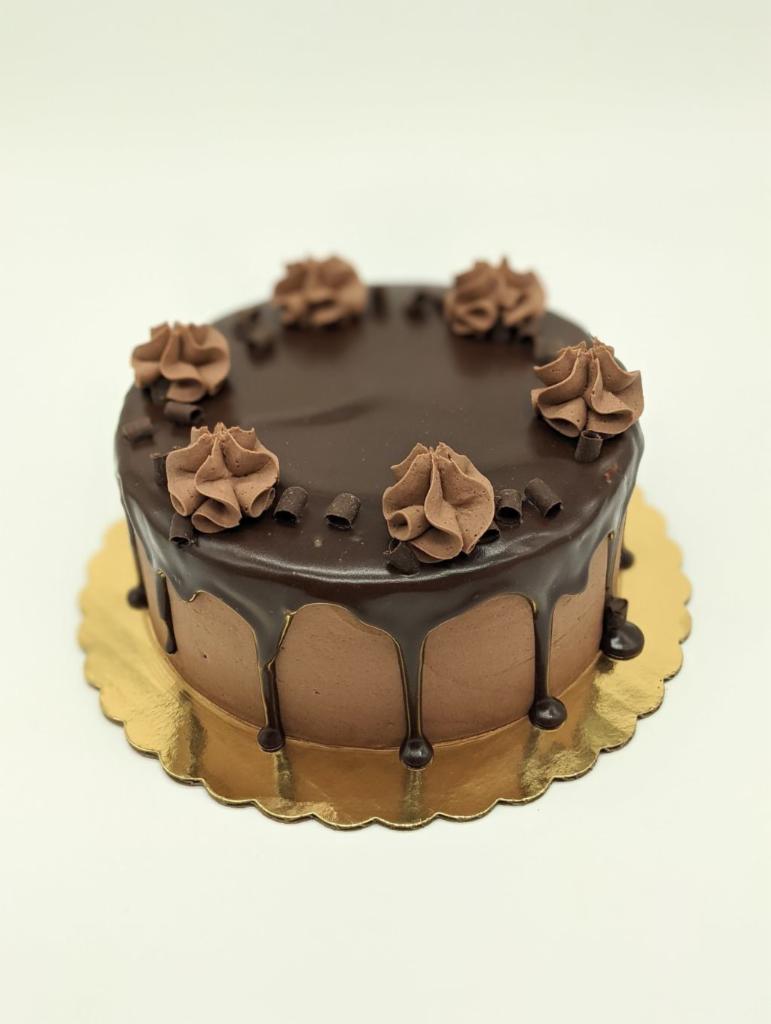The Breakup Cake · Chocolate cake, chocolate mousse filling, chocolate buttercream, chocolate ganache.