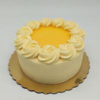 Lemonade Stand Cake · White cake, lemon curd filling, lemon buttercream.