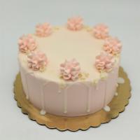 Pretty in Pink Cake · Pink Champagne cake, white chocolate mousse filling, vanilla buttercream, white chocolate ga...