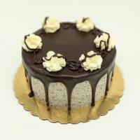 The Executive Cake · Chocolate cake, cookies and cream mousse filling, cookies and cream buttercream, chocolate g...