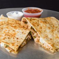 Grilled Chicken Quesadilla · Grilled chicken, onions, green peppers, mozzarella, and cheddar cheese in a folded tortilla.
