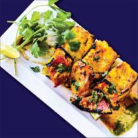 Paneer Tikka · Cottage Cheese Cubes Marinated 
with Chef’s Special Spices