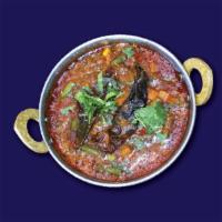 Veg Kolhapuri · Mixed Vegetable Thick Curry Gravy with
Specially Blended Curry Masala