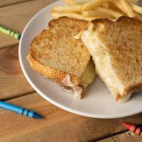 Kids Grilled Cheese · four slices of white cheddar between warm & toasty bread served with fries
