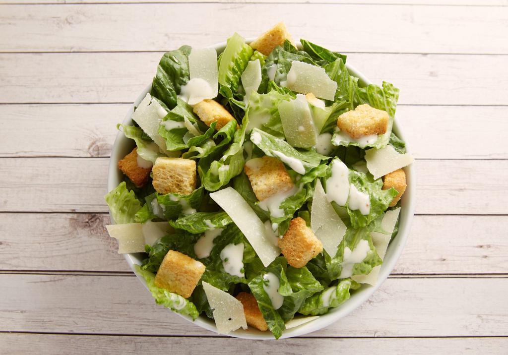 Side Salad Caesar · Green salad with Caesar dressing and cheese.