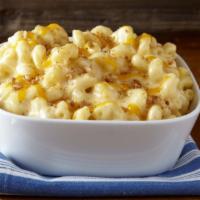 Macaroni and Cheese  · Macaroni baked in a creamy Alfredo and cheddar sauce. 