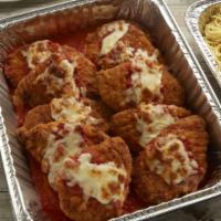 Chicken Parmesan  · Breaded chicken breast baked with mozzarella cheese, served with our homemade tomato sauce a...