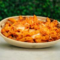 Penne alla Vodka  · Penne Pasta with a hint of heavy cream, house made tomato sauce, Parmesan cheese, parsley wi...