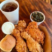 1/4 Bird Combo · 1 Nashville hot thigh, 1 Nashville hot drum, 1 side 1 roll, 1 sweet and spicy pickle and a 2...