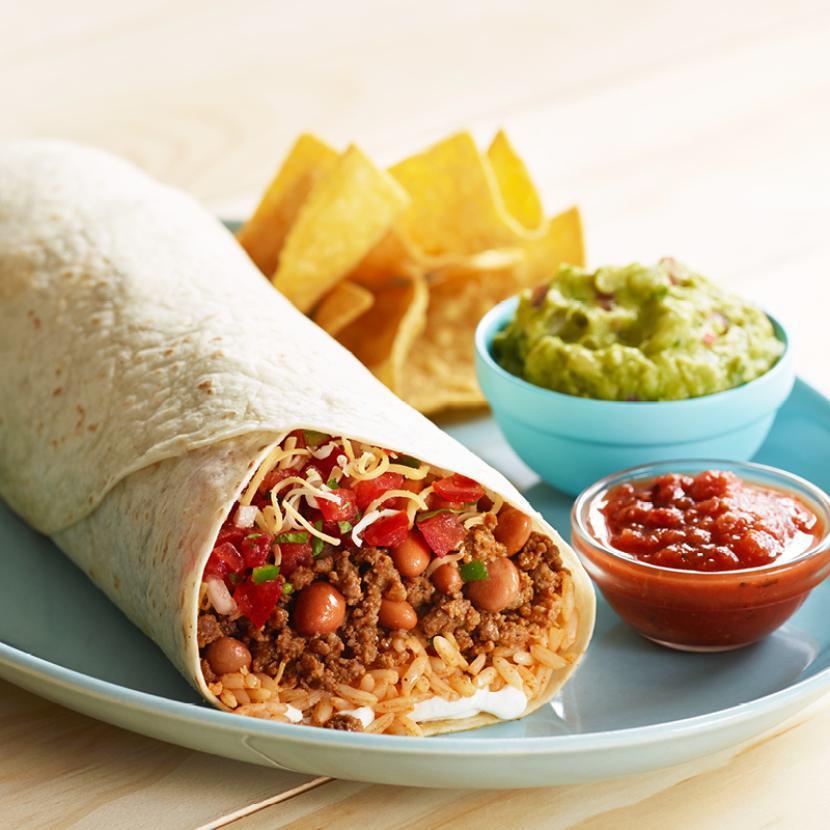 Mondito Burrito Combo · Our small burrito is served on a flour tortilla with rice and your choice of beans, meat and toppings. Includes 21 oz. drink and your choice of side.