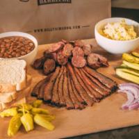 Gameday Pack · Serves 3-4. 1 1/2 pound of our tasty smoked meat, 2 sides (1 pint each), and 4 slices of Tex...