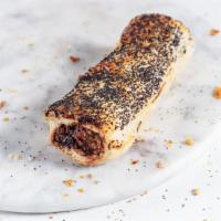 Lamb, Almond & Harissa Sausage Roll (Baked) · This sausage roll is a great mix of texture and flavor. You smell the lamb, taste the sweetn...