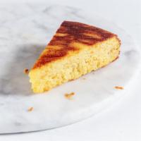 Slice of Orange & Almond Cake · Gluten free and dairy free. Made with just whole oranges, ground almonds, eggs, sugar and ba...